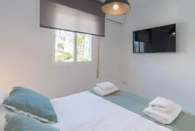 Habitación de Casa adosada en venta en Benalmádena con Aire acondicionado, Calefacción y Jardín privado
