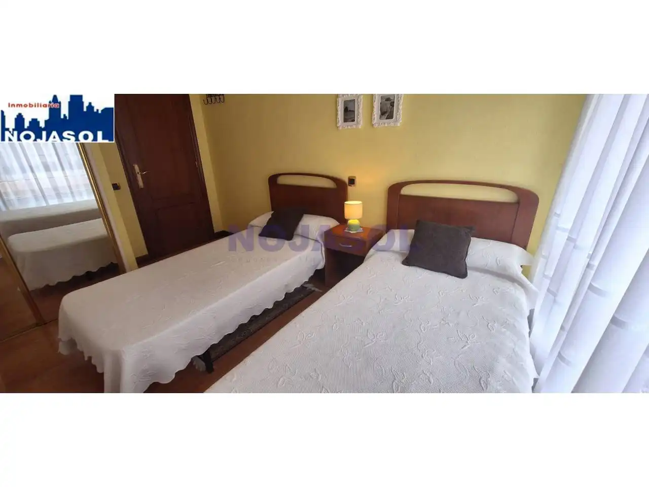 Dormitori de Apartament de lloguer en Noja amb Calefacció, Terrassa i Moblat