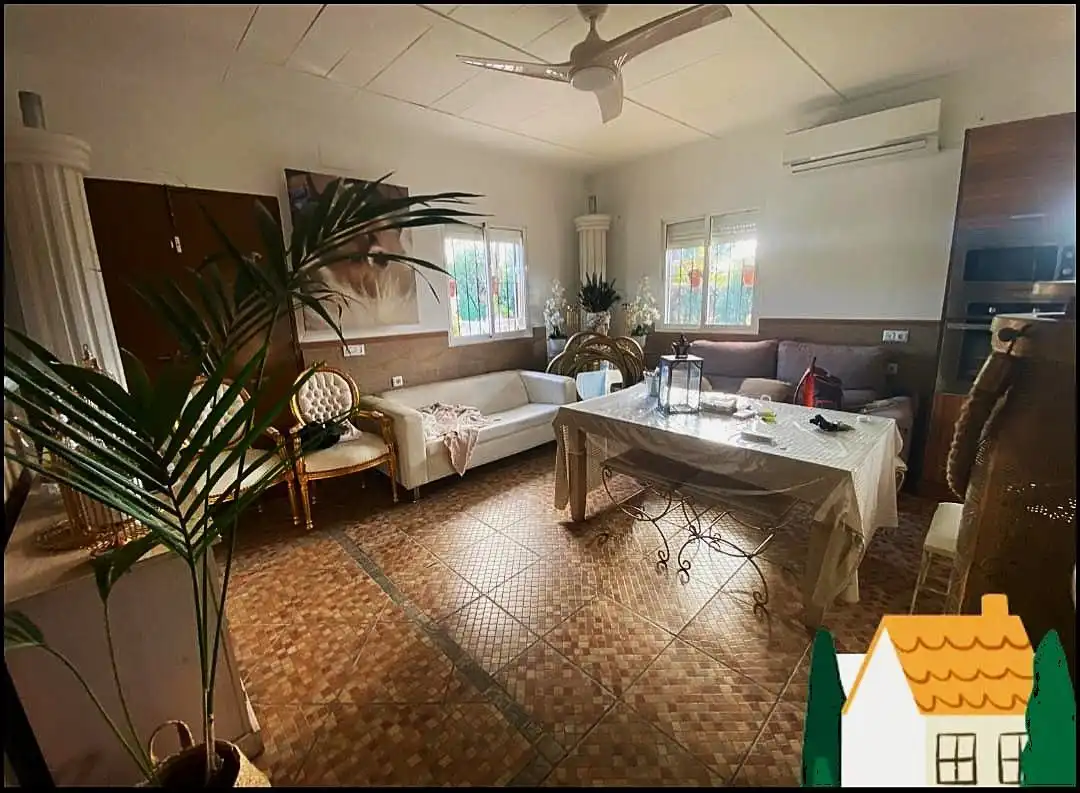 Sala de estar de Finca rústica en venta en Arroyo de San Serván con Aire acondicionado, Calefacción y Jardín privado