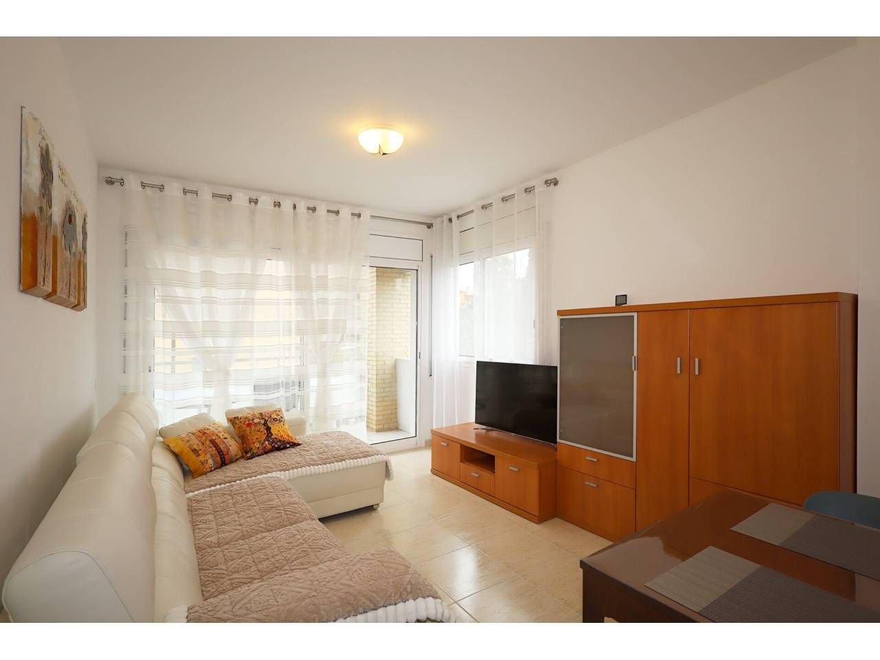 Wohnzimmer von Wohnung zum Verkauf in Lloret de Mar mit Klimaanlage, Heizung und Möbliert