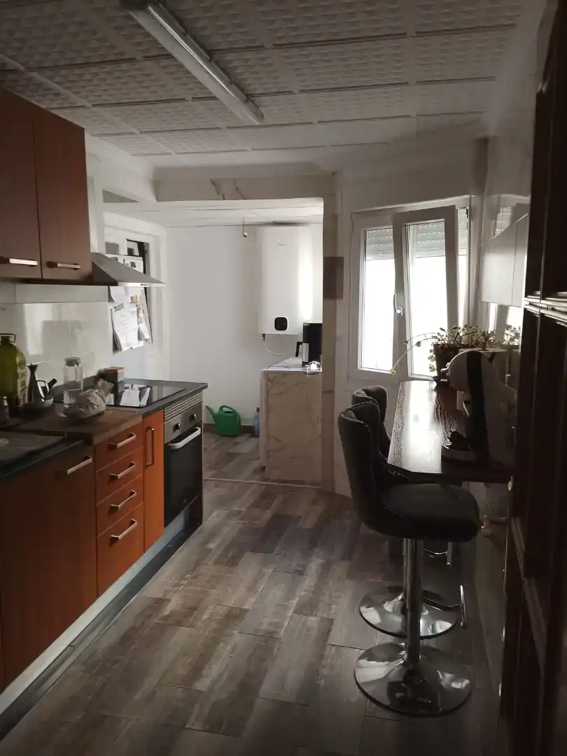 Kitchen of Flat for share in Onil  with Air Conditioner, Private garden and Storage room