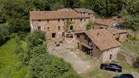 Vista exterior de Finca rústica en venda en La Vall de Bianya amb Calefacció, Jardí privat i Traster