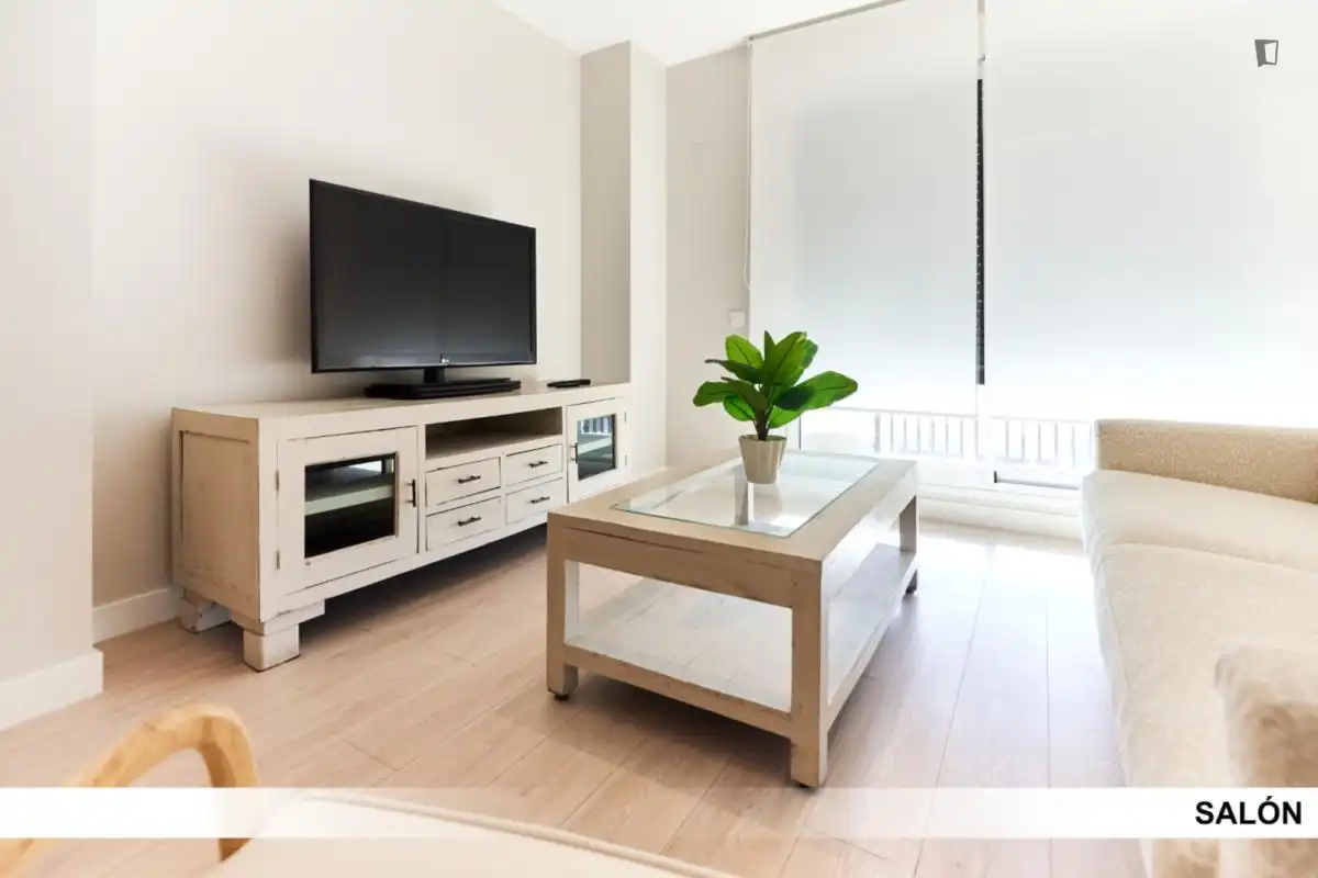 Sala d'estar de Apartament per a compartir en Dos Hermanas amb Aire condicionat, Calefacció i Moblat