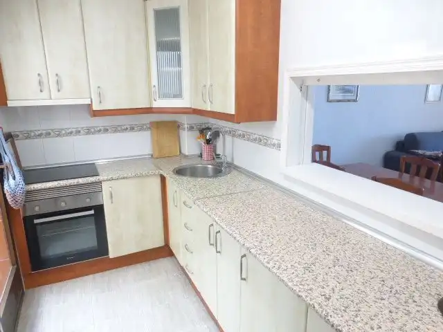 Cocina de Apartamento en venta en Roquetas de Mar con Aire acondicionado y Piscina comunitaria