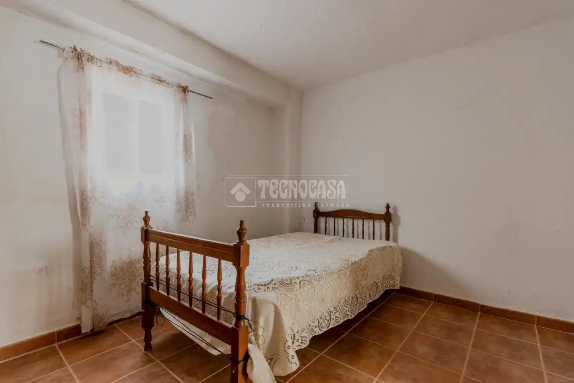 Dormitori de Casa adosada en venda en Güéjar Sierra amb Balcó
