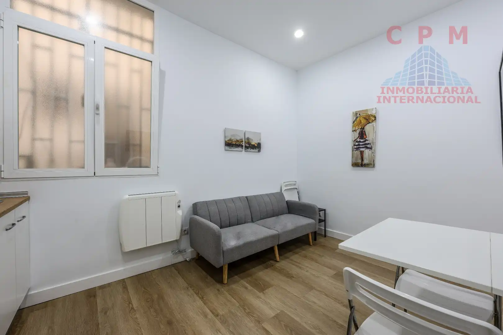 Sala d'estar de Pis de lloguer en  Madrid Capital amb Calefacció, Parquet i Moblat