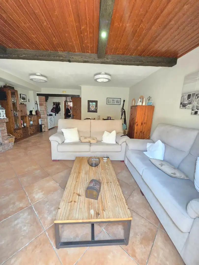 Sala d'estar de Casa adosada en venda en Alhaurín de la Torre amb Aire condicionat, Terrassa i Piscina comunitària