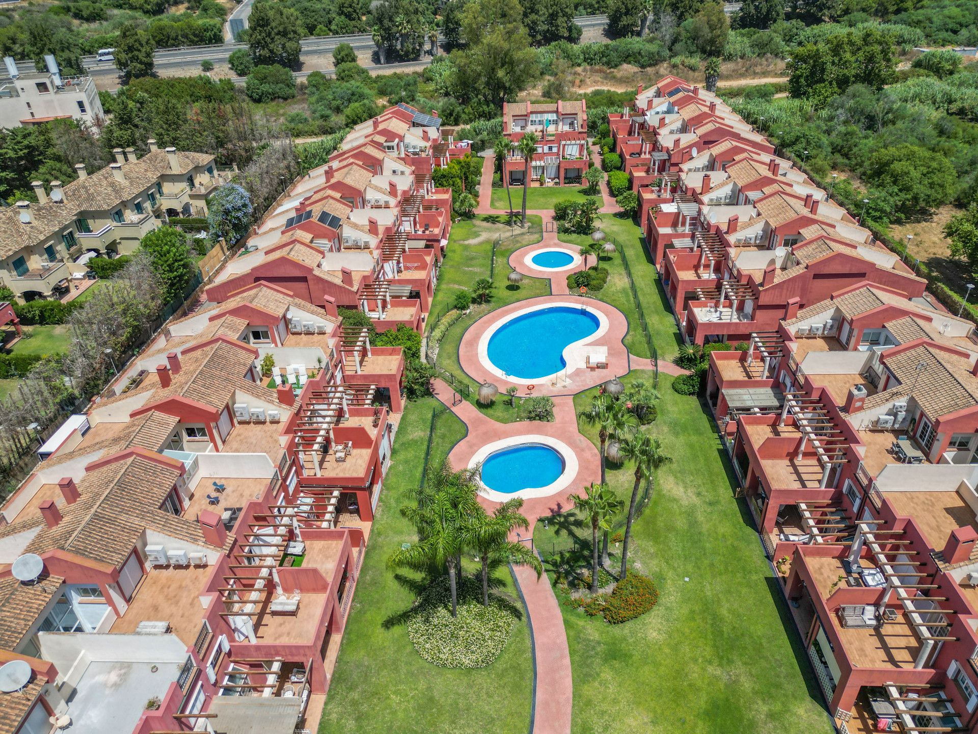 Exterior view of Single-family semi-detached for sale in Sotogrande  with Air Conditioner, Terrace and Storage room