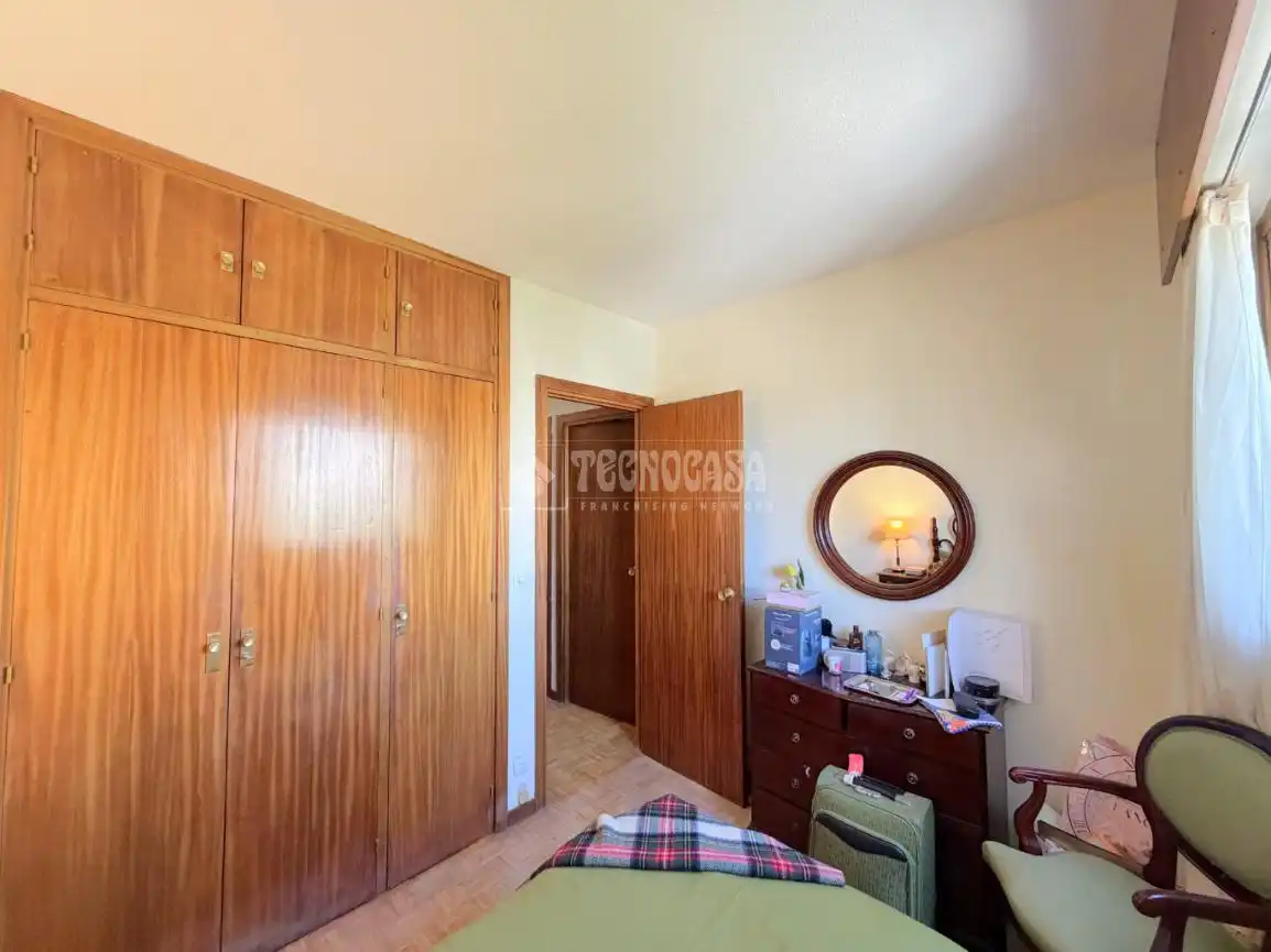 Schlafzimmer von Wohnung zum Verkauf in Madrid mit Heizung, Privatgarten und Schwimmbad