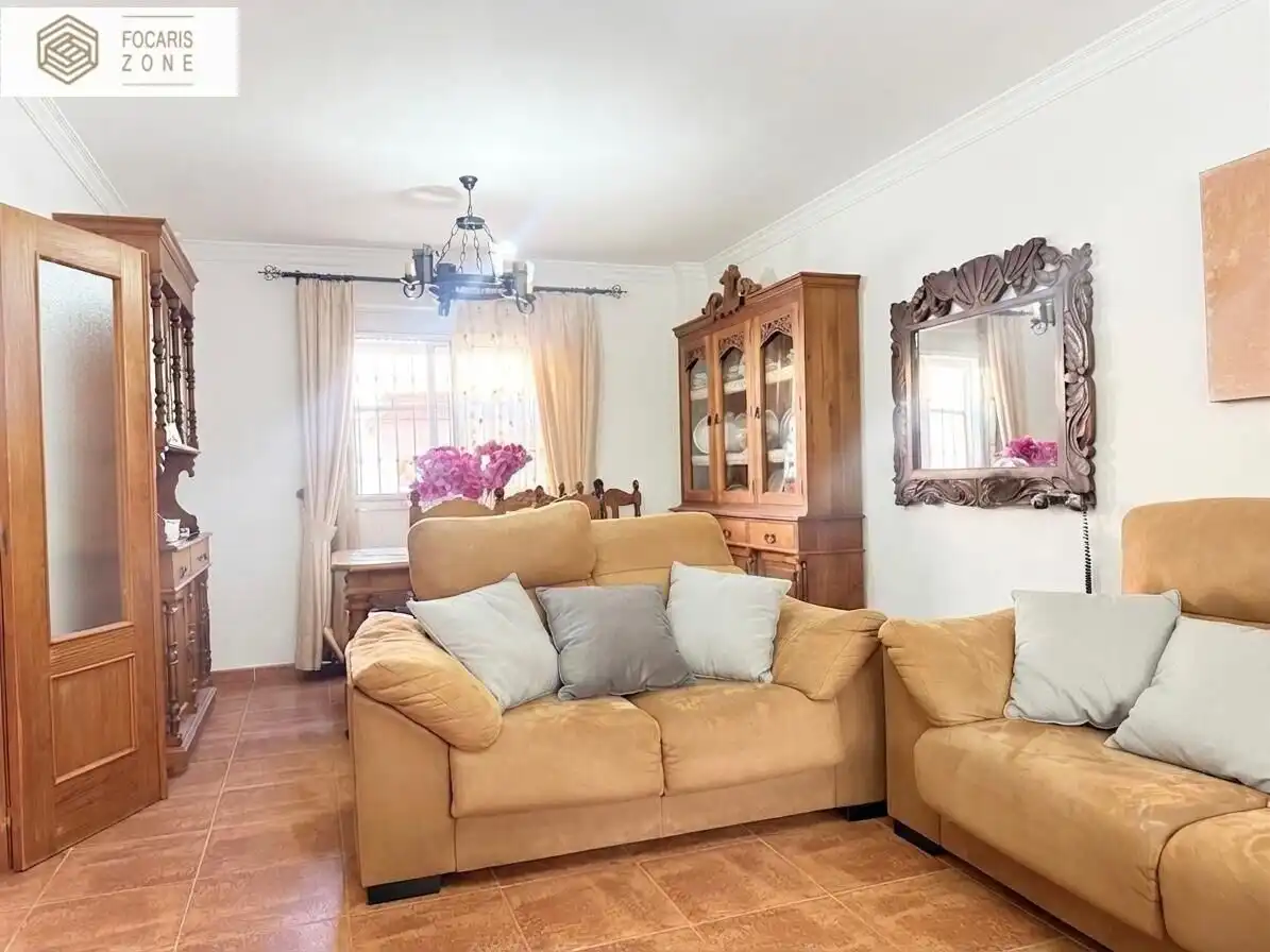 Sala de estar de Casa adosada en venta en Málaga con Aire acondicionado, Calefacción y Terraza