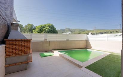 Swimming pool of Single-family semi-detached for sale in Viladecans  with Air Conditioner, Heating and Terrace