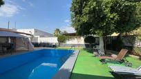Swimming pool of Country house for sale in Utrera
