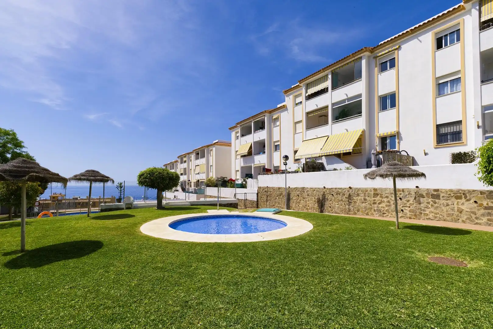 Garten von Wohnung zum Verkauf in Benalmádena mit Klimaanlage, Privatgarten und Abstellraum