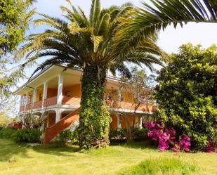 Vista exterior de Casa o xalet en venda en Muros de Nalón amb Calefacció, Jardí privat i Terrassa