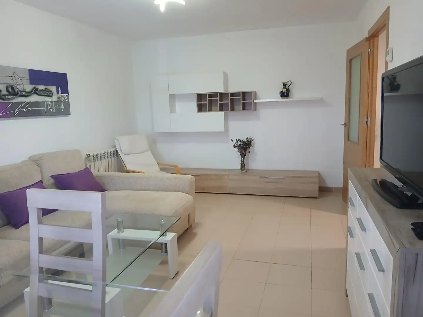 Sala de estar de Casa adosada en venta en Cáceres con Calefacción, Terraza y Balcón