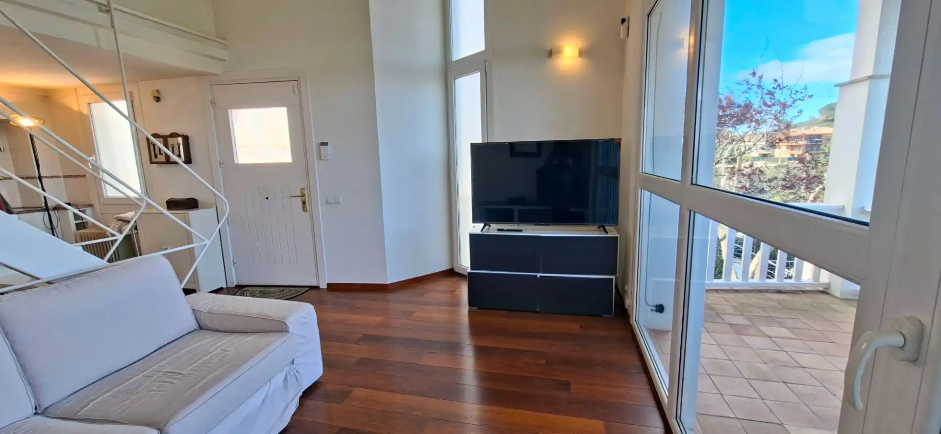Sala de estar de Casa adosada en venta en Begur con Aire acondicionado, Calefacción y Jardín privado