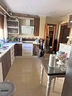 Cuina de Casa o xalet en venda en Linares amb Aire condicionat, Jardí privat i Terrassa