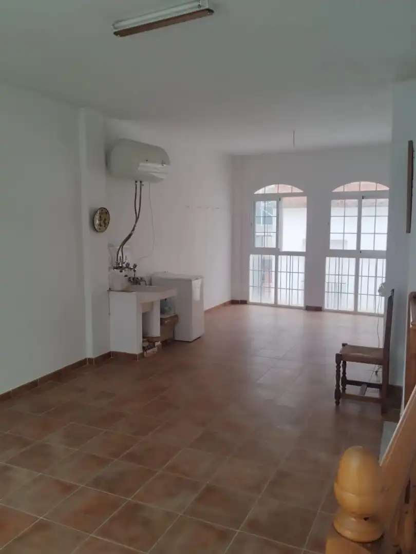 Sala d'estar de Casa adosada en venda en Tolox amb Moblat