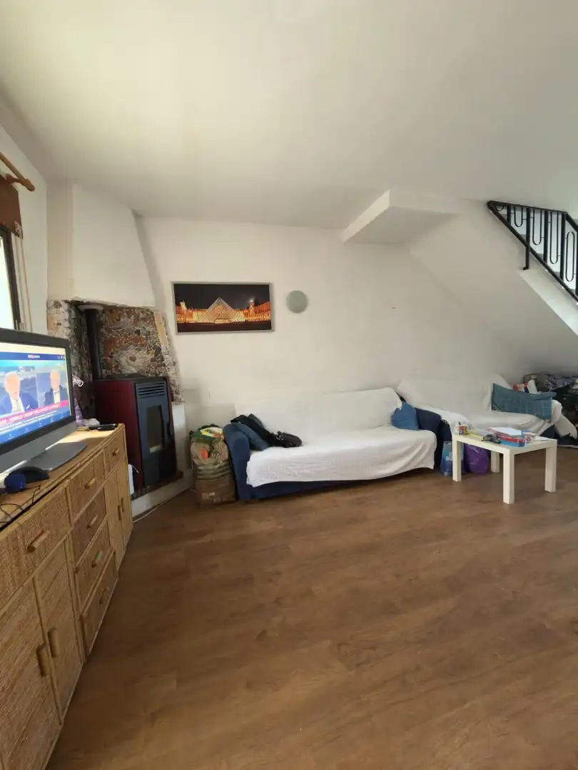 Sala d'estar de Casa adosada en venda en Benalmádena amb Aire condicionat, Terrassa i Moblat