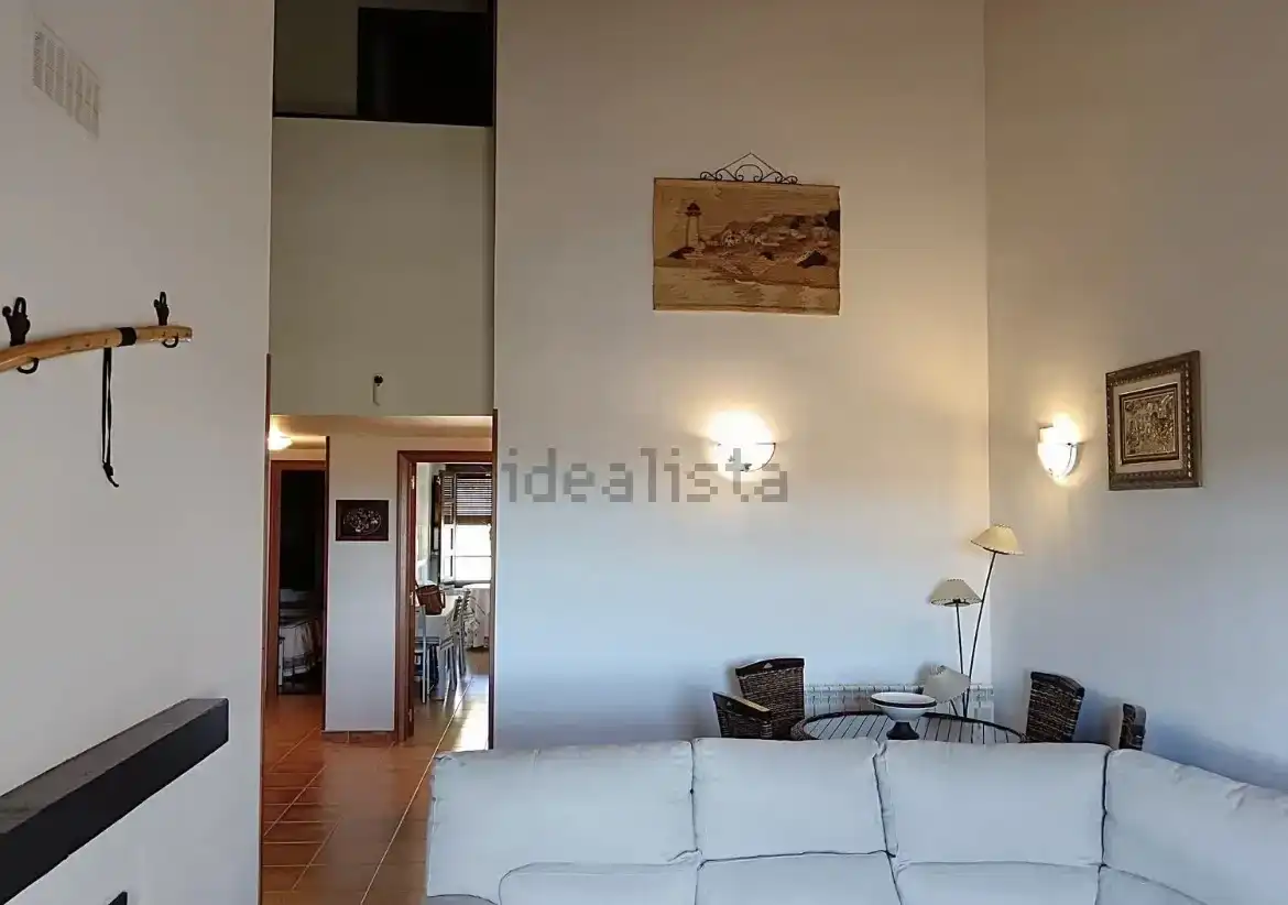Living room of Duplexes for sale in Jaca  with Air Conditioner and Swimming Pool