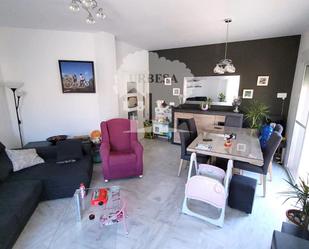 Sala d'estar de Casa adosada en venda en Motril amb Aire condicionat, Terrassa i Traster