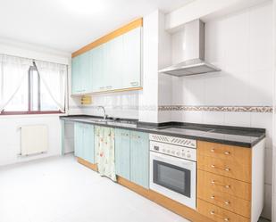 Kitchen of Flat for sale in Oviedo   with Heating, Parquet flooring and Storage room