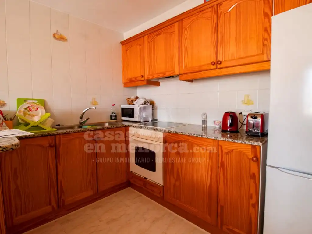 Kitchen of Flat for sale in Es Castell  with Terrace, Swimming Pool and Community pool