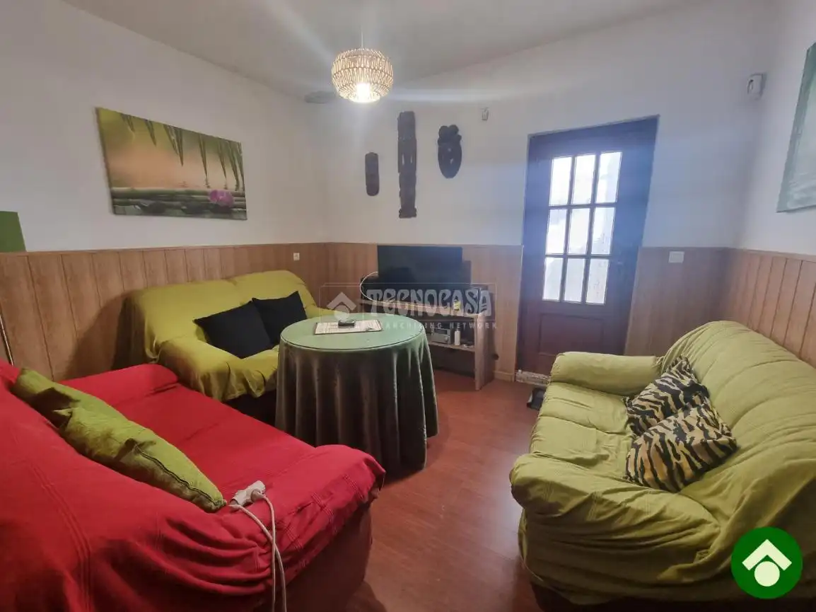 Sala de estar de Casa adosada en venta en Santa Fe con Trastero