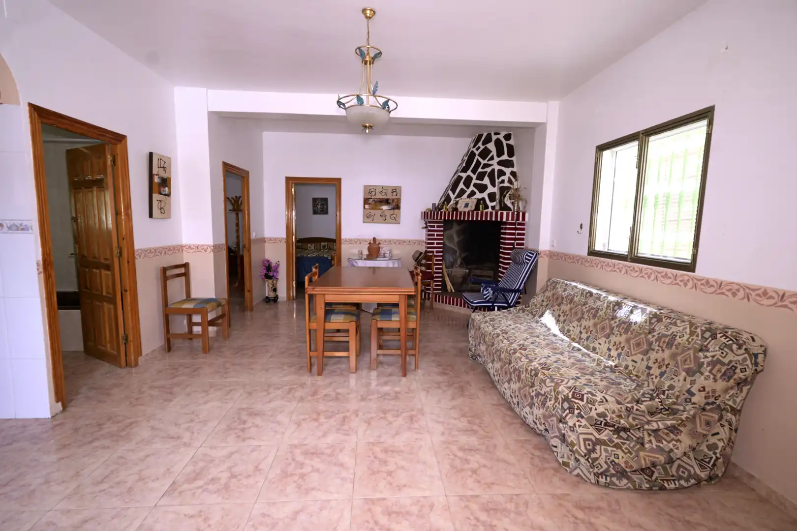 Sala d'estar de Casa o xalet en venda en Nevada amb Jardí privat, Terrassa i Moblat