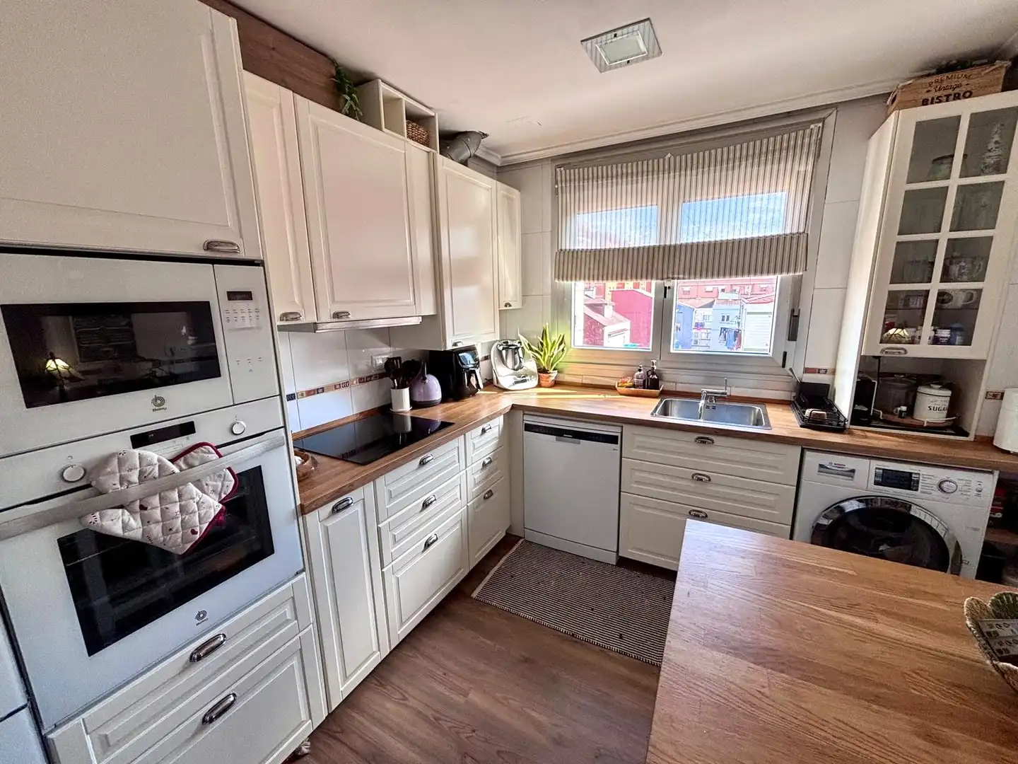 Kitchen of Duplexes for sale in Gijón   with Heating, Parquet flooring and Oven