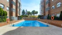 Swimming pool of Flat for sale in  Madrid Capital  with Air Conditioner and Terrace