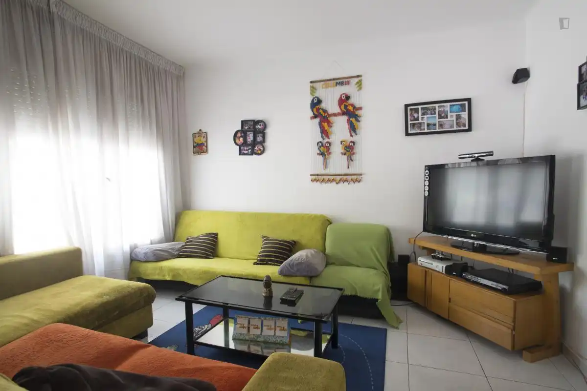 Sala de estar de Apartamento para compartir en Barcelona con Aire acondicionado, Calefacción y Amueblado