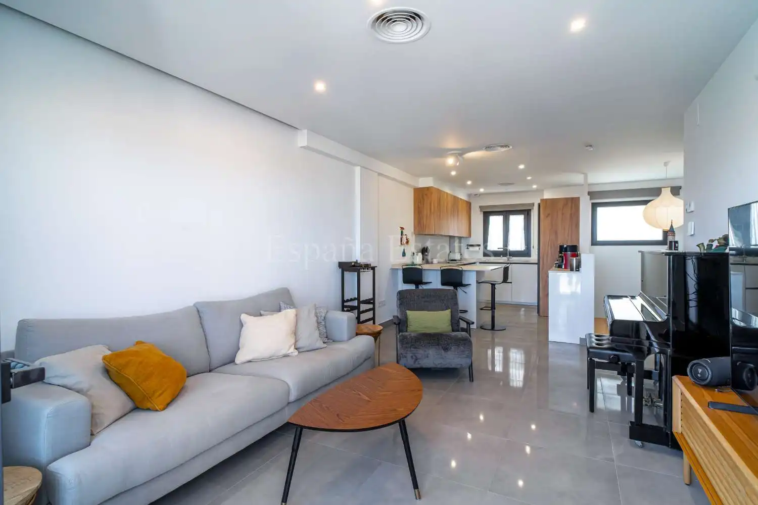 Sala de estar de Casa adosada en venta en Nerja con Aire acondicionado, Calefacción y Terraza