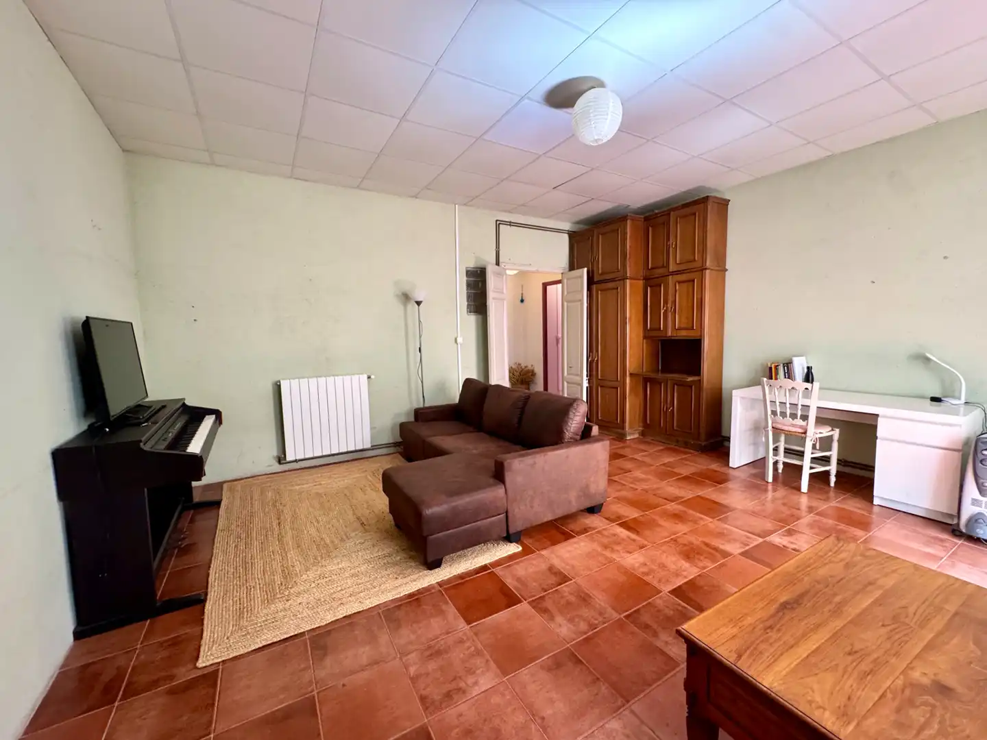 Sala d'estar de Casa adosada en venda en Sant Feliu de Guíxols amb Calefacció, Jardí privat i Terrassa