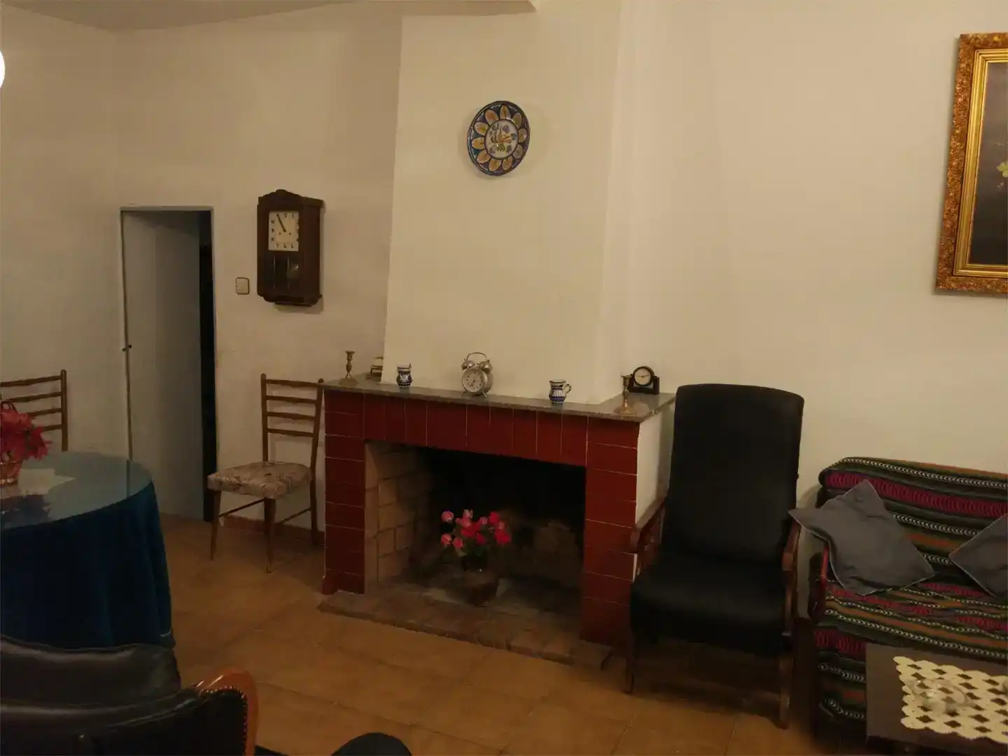 Sala de estar de Casa adosada en venta en Cañamero