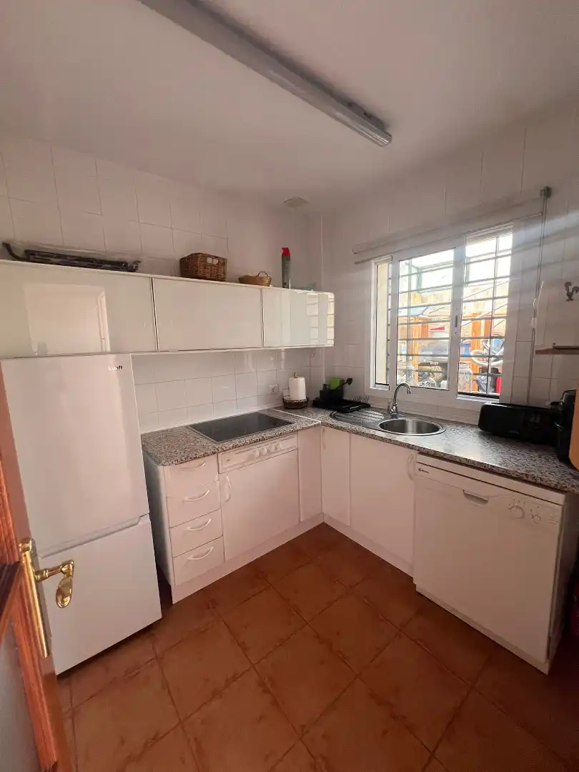 Cocina de Casa adosada en venta en Islantilla con Jardín privado, Trastero y Piscina comunitaria