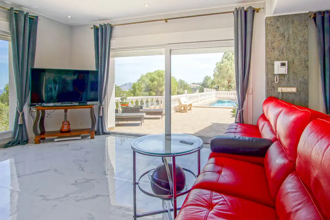 Sala d'estar de Casa o xalet en venda en La Nucia amb Aire condicionat, Terrassa i Traster