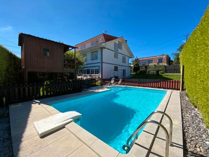 Piscina de Casa o xalet en venda en Santiago de Compostela  amb Calefacció, Jardí privat i Terrassa