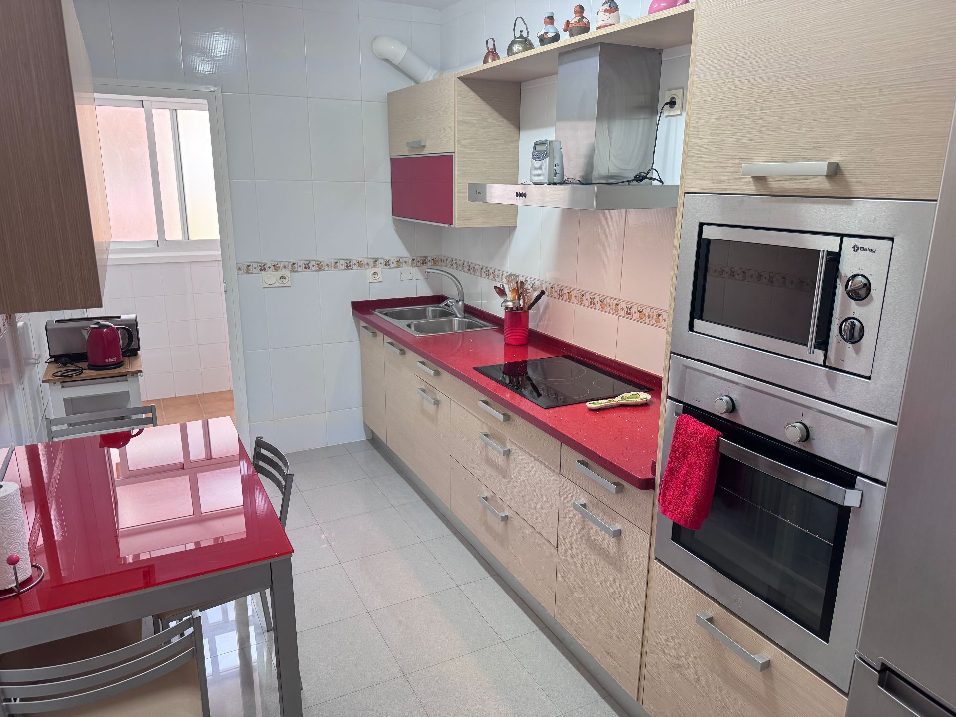 Cuina de Apartament en venda en Roquetas de Mar amb Aire condicionat, Terrassa i Piscina comunitària