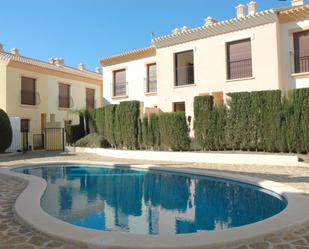 Exterior view of Single-family semi-detached for sale in La Unión  with Terrace, Swimming Pool and Balcony