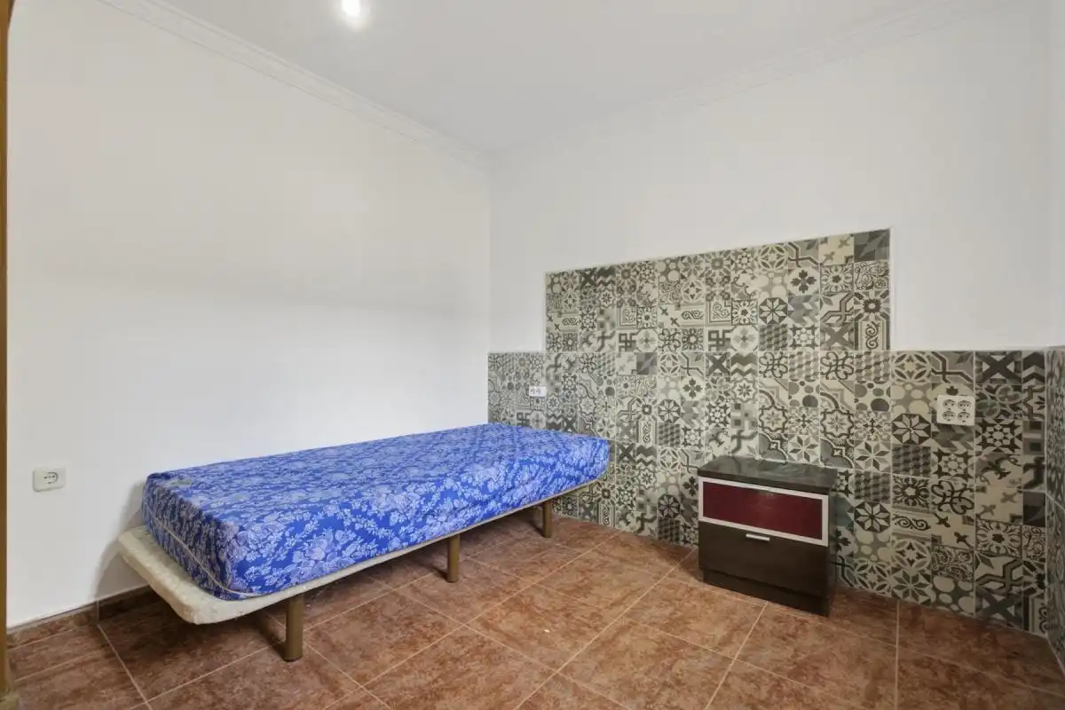 Habitación de Finca rústica en venta en La Rinconada con Calefacción, Jardín privado y Terraza