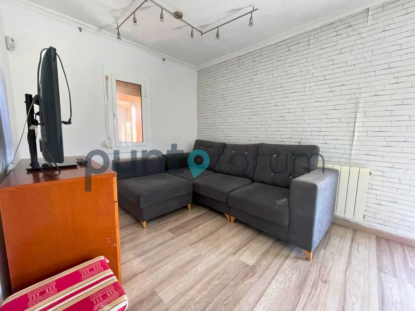 Sala de estar de Piso en venta en Barcelona con Calefacción, Trastero y Amueblado