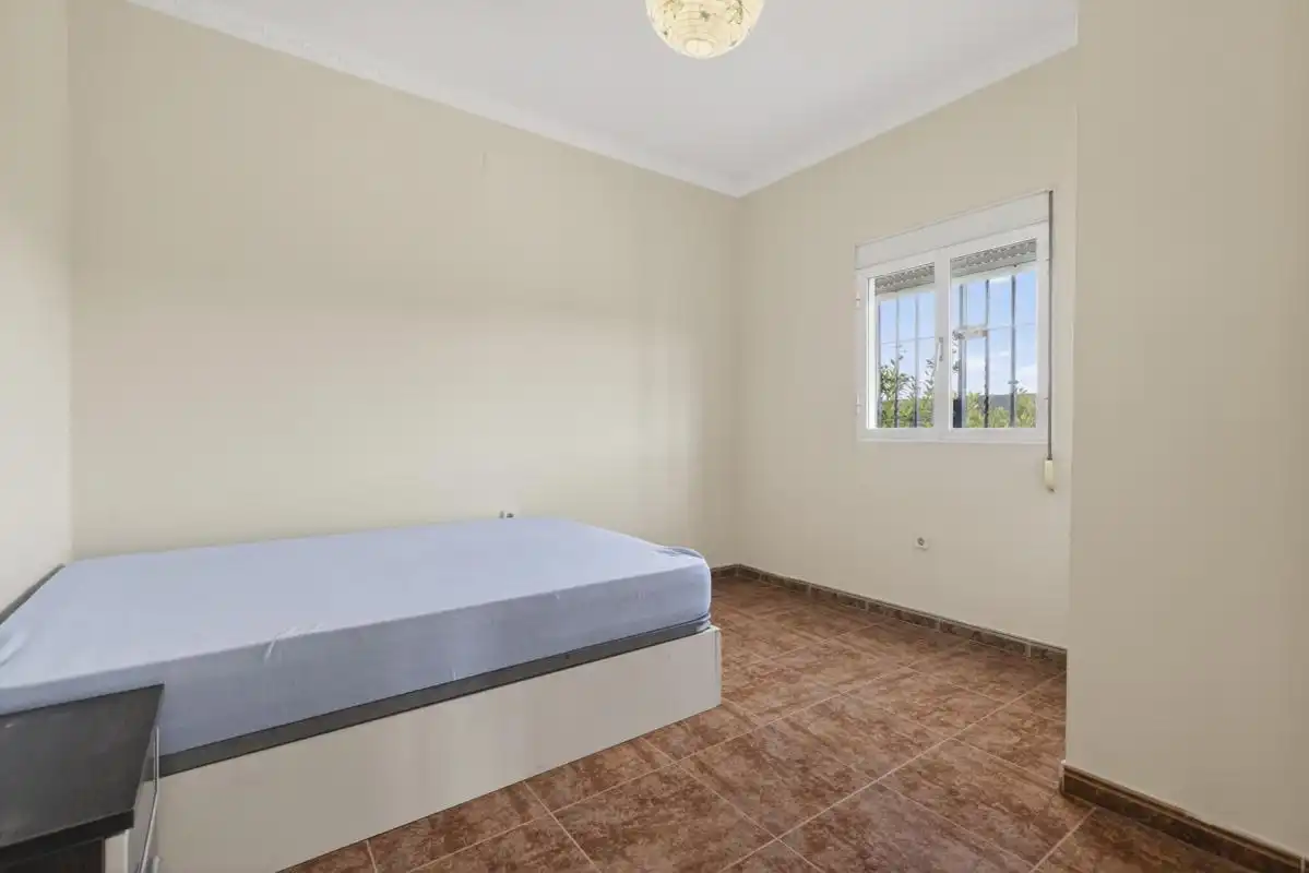 Habitación de Finca rústica en venta en La Rinconada con Calefacción, Jardín privado y Terraza