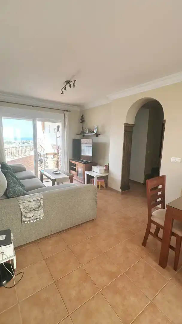 Sala de estar de Casa adosada en venta en Nerja