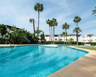 Swimming pool of Single-family semi-detached for sale in Marbella  with Air Conditioner, Private garden and Terrace