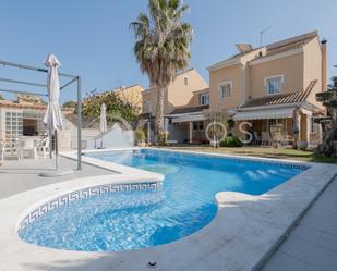 Piscina de Casa adosada en venda en Puçol amb Aire condicionat, Jardí privat i Terrassa