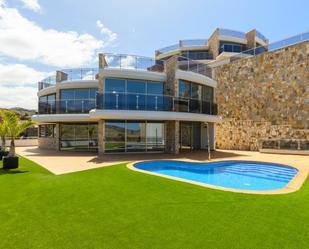 Vista exterior de Casa o xalet en venda en Mogán amb Aire condicionat, Jardí privat i Parquet