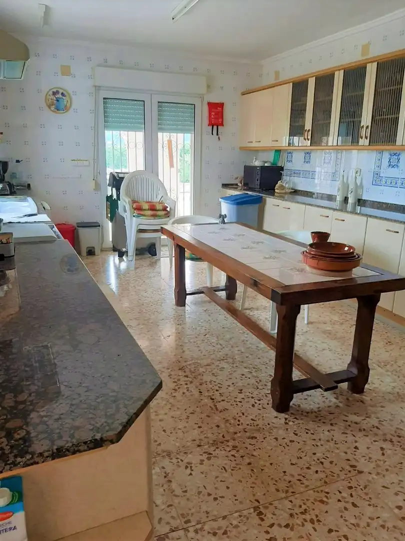 Cuina de Casa o xalet en venda en Dénia amb Calefacció, Jardí privat i Piscina
