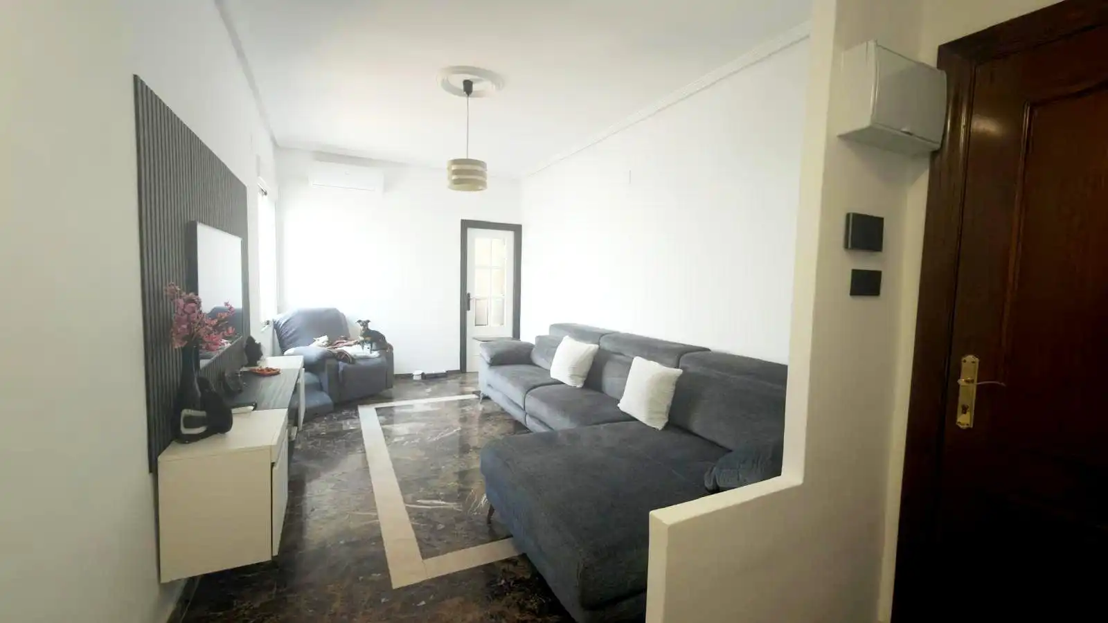 Sala d'estar de Casa adosada en venda en La Unión amb Aire condicionat, Jardí privat i Terrassa