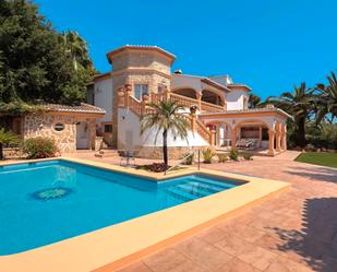 Vista exterior de Casa o xalet en venda en Moraira amb Aire condicionat, Calefacció i Jardí privat
